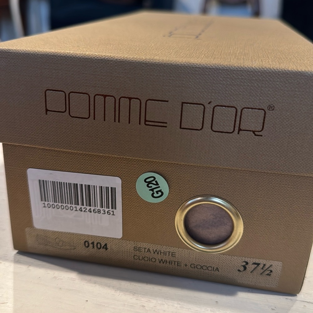 Pomme D’or cream color loafers.